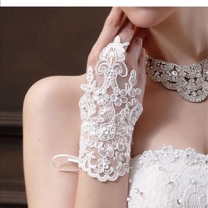 Beautiful lace gloves with rhinestones